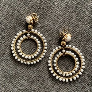 White statement earrings